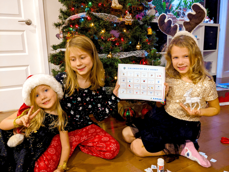 Girls happy to have made an advent calendar of activities in Laval